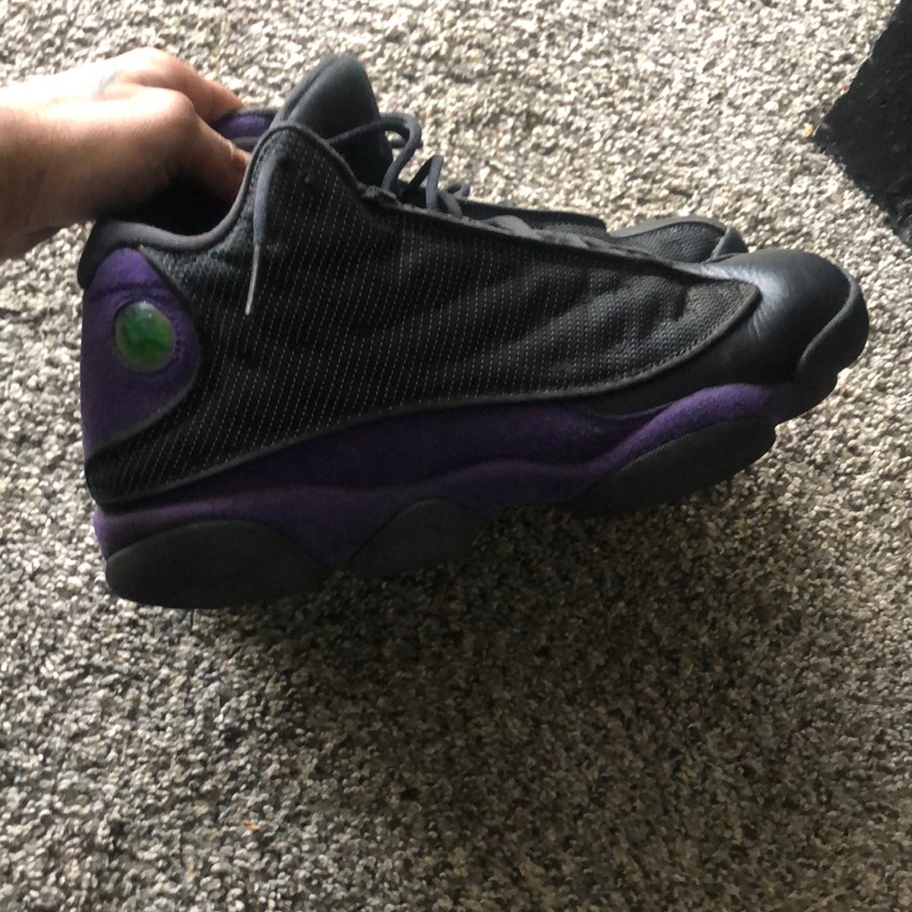 Jordan Sneakers in Black and Purple with Breathable Mesh and Sleek Design